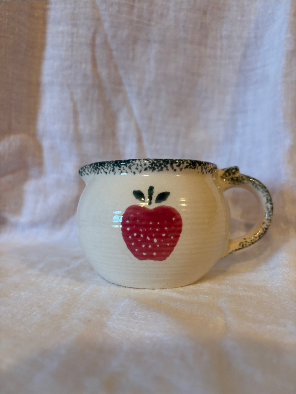 Cream Ceramic Mug with Red Apple Accent